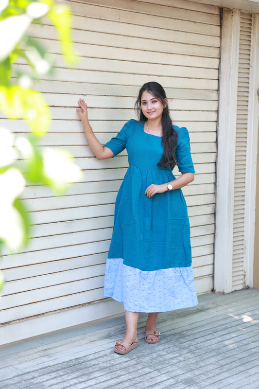 Neemai ramar green muslin cotton maternity maxi gown with elegant contrast border design, puff sleeves and lightweight breathable fabric for summer everyday comfort, plus size friendly clothing.