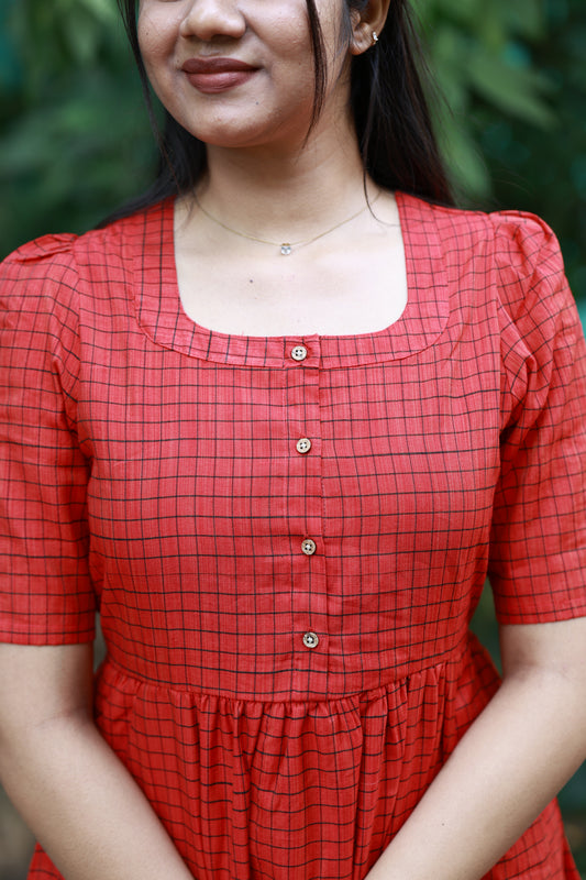 Neemai red butter silk checkered maternity dress with square neckline and front buttons, feeding friendly design, soft elegant gown for pregnancy moms