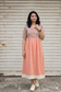 Neemai premium pubbly cotton Peach-tone maternity maxi dress with nursing friendly double side feeding zips, breathable fabric and comfortable everyday fit for moms.