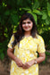 Lemon color flower print maternity kurti for comfort fit.