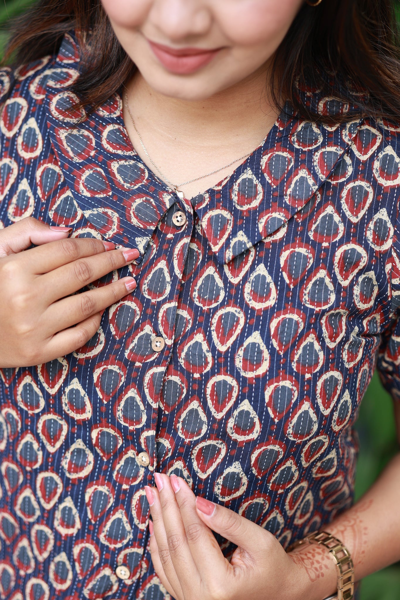 Mom-friendly front feeding buttons and collar detailing on Navy blue maternity kurti.