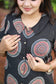 Top/Kurti - Black circle printed maternity kurti featured buttoned feeding opening and shirt-style neckline.