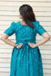 Adjustable back tie detail on peacock blue silk maternity gown by neemai, bump friendly pregnancy gown, festive maternity collection 