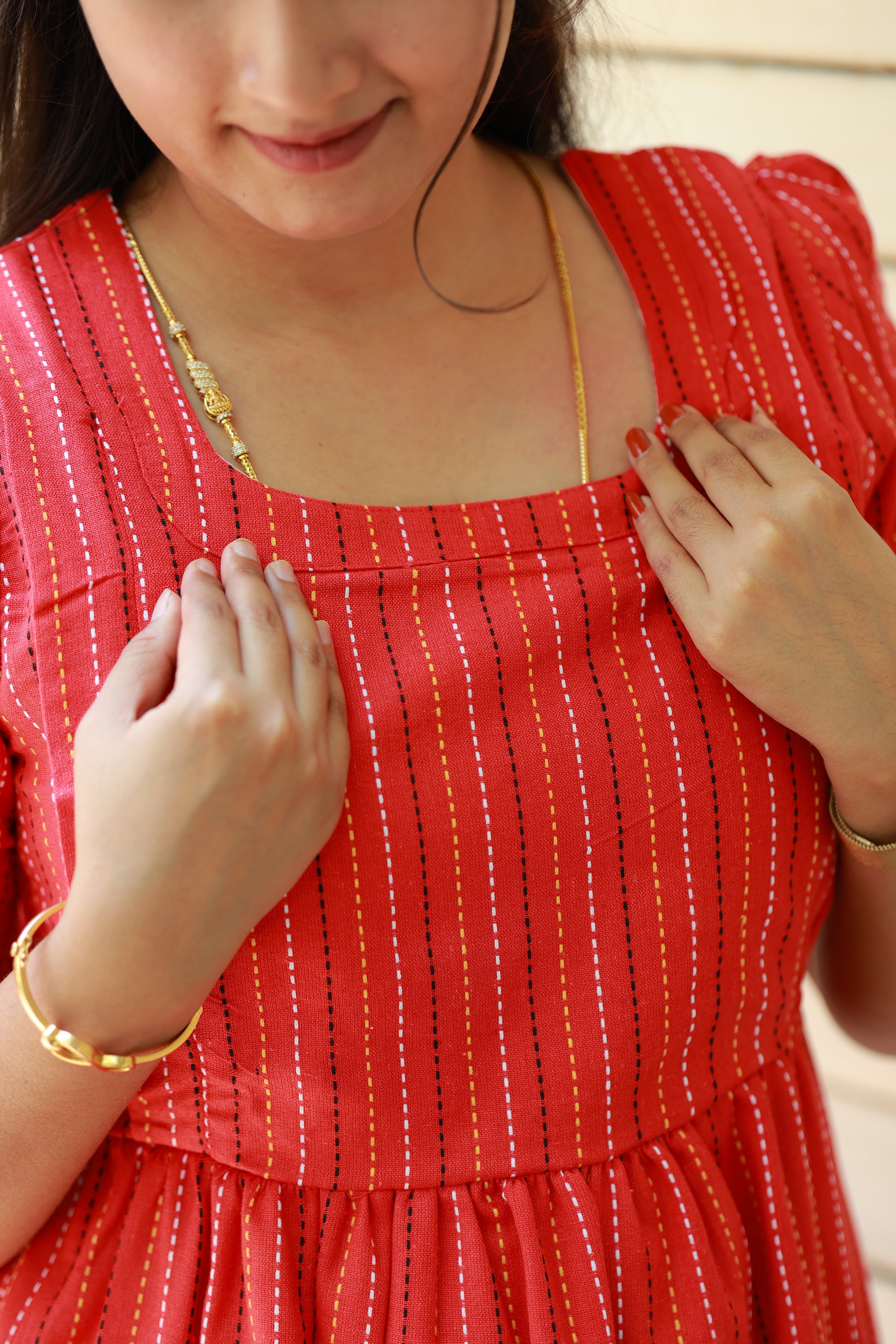 Neemai red maternity gown with elegant neck design, hot weather comfort wear for pregnant and postpartum moms.