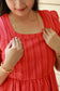Neemai red maternity gown with elegant neck design, hot weather comfort wear for pregnant and postpartum moms.