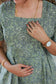 Neemai Sage green printed cotton dress with elegant square neckline, soft breathable fabric and comfortable everyday wear look.