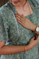 Neemai Feeding-friendly green cotton dress with concealed zip, easy nursing access design for pregnancy and postpartum moms..