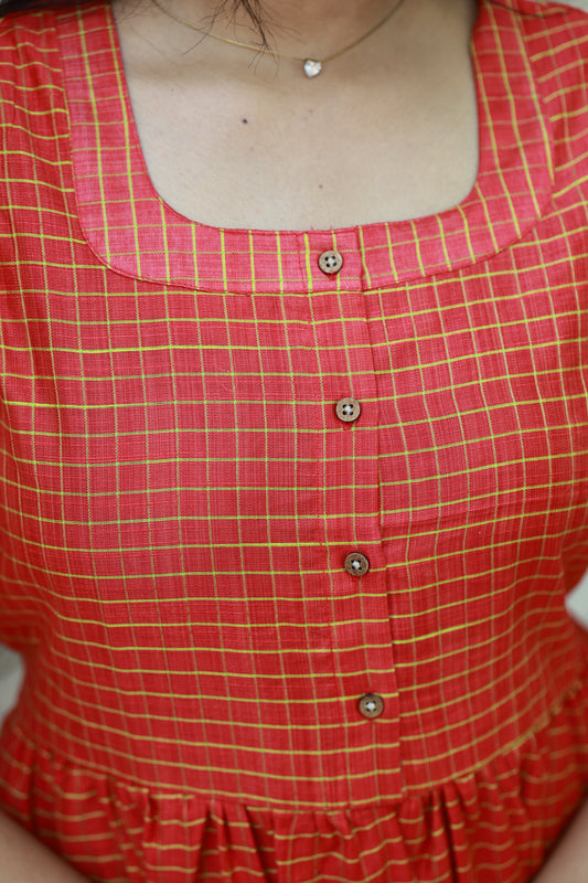 Neemai orange and green checkered maternity dress with button-down feeding access, nursing friendly outfit, soft butter silk fabric, postpartum essential wear