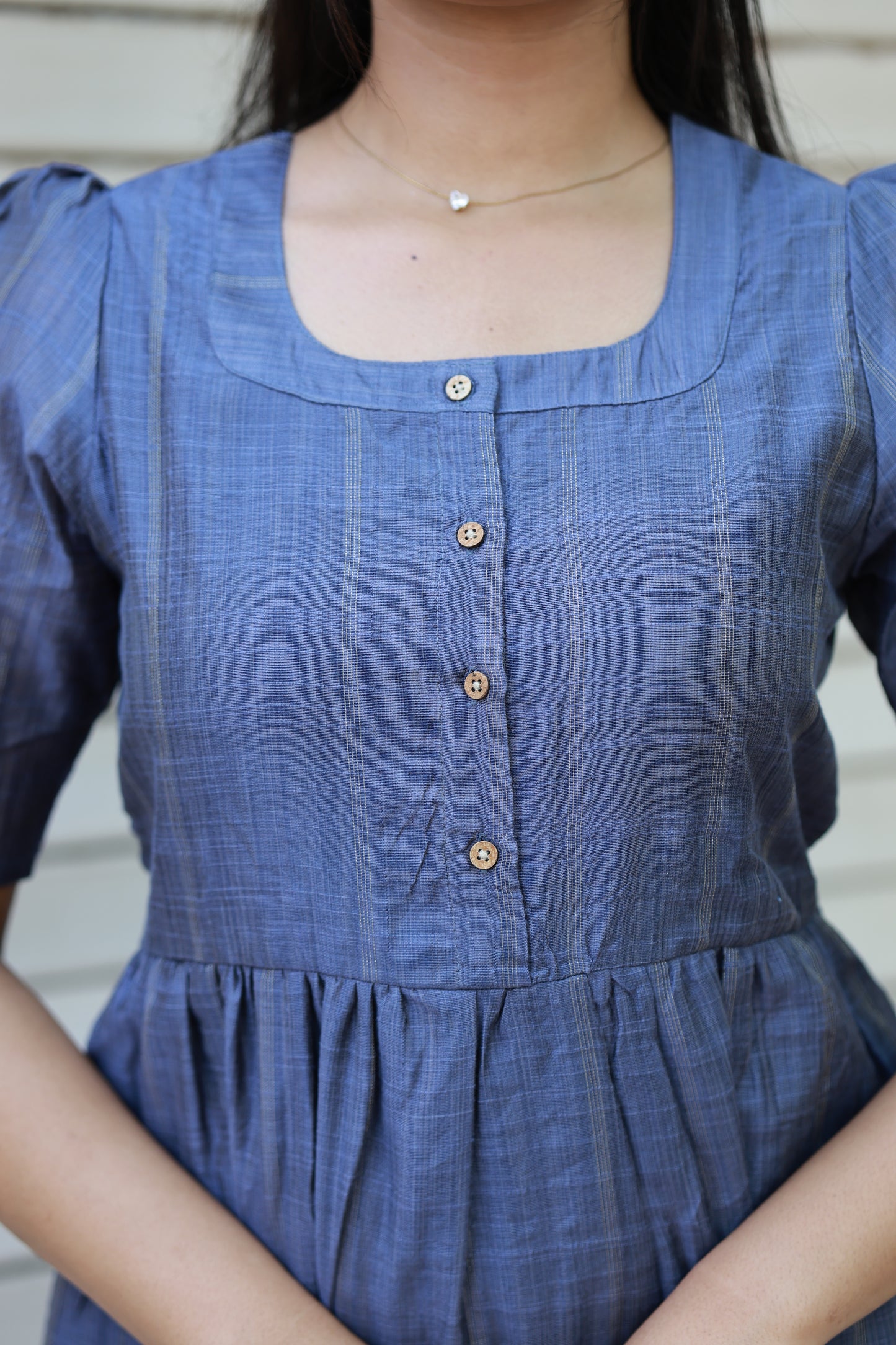 Neemai blue butter silk maternity dress with square neckline and front button opening, feeding friendly design, weightless soft fabric