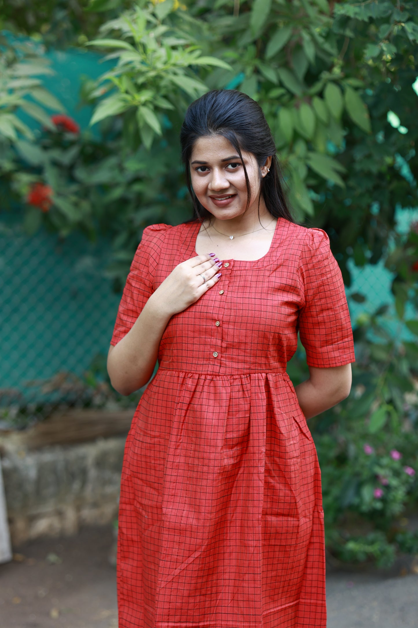 Neemai red and black checkered butter silk maternity dress with button-down feeding access, nursing friendly outfit, soft breathable fabric for summer
