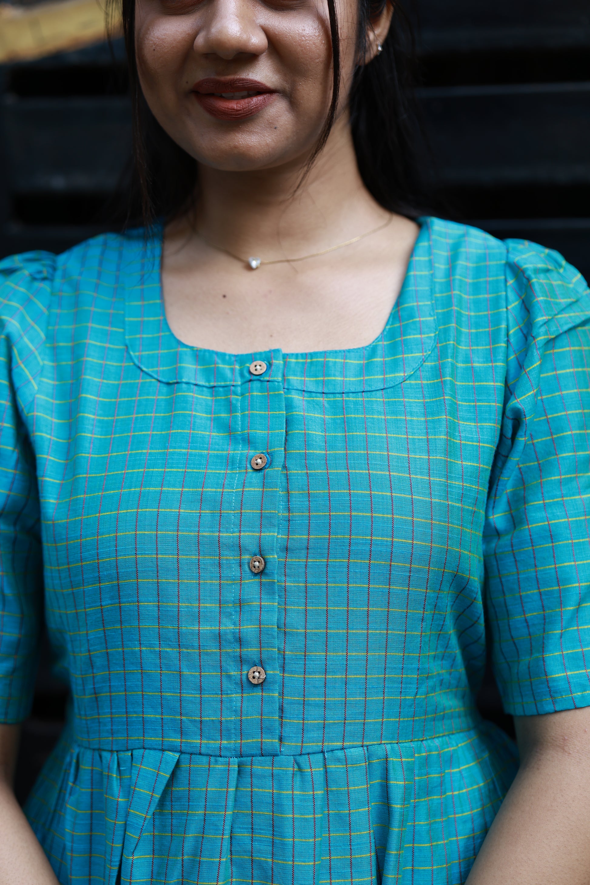 Neemai teal butter silk checkered maternity dress with nursing friendly front buttons, breathable fabric, plus size comfortable daily wear