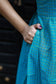 Functional pocket detail on neemai's blue silk gown, elegant daily wear, summer friendly traditional outfit 