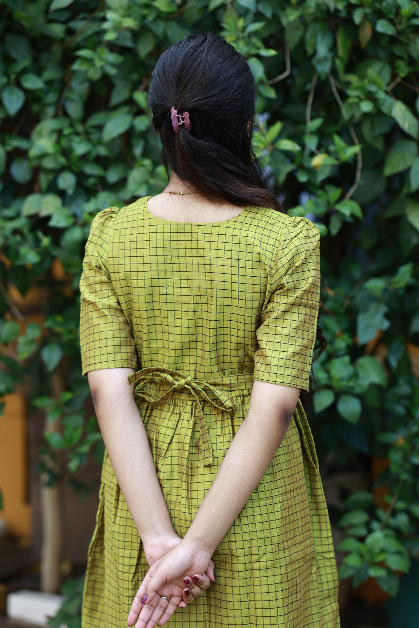 Neemai back view green butter silk checkered maternity dress with tie-up detail, bump friendly pregnancy gown for festivals, comfortable regular wear 