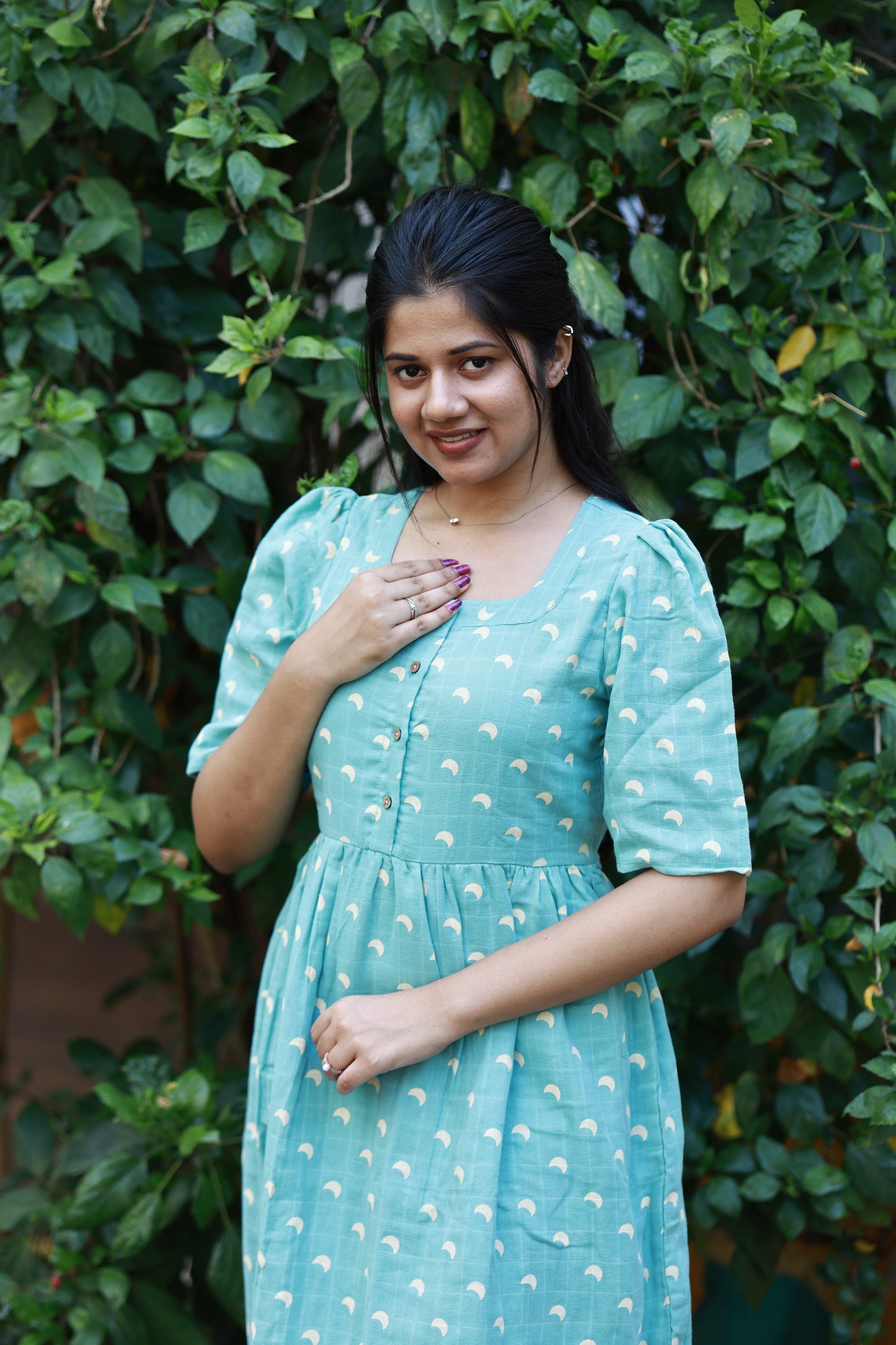 Neemai blue muslin cotton maternity maxi gown with soft breathable fabric, puff sleeves and elegant flowy fit for all day comfort.