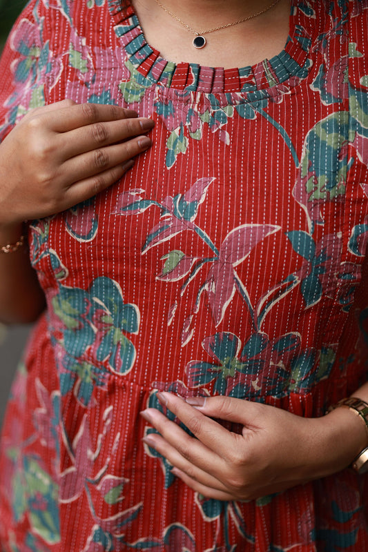 Maternity Midi/Gown - Wildflower Rust showcasing colorful floral design and round neck, perfect for comfort during pregnancy.
