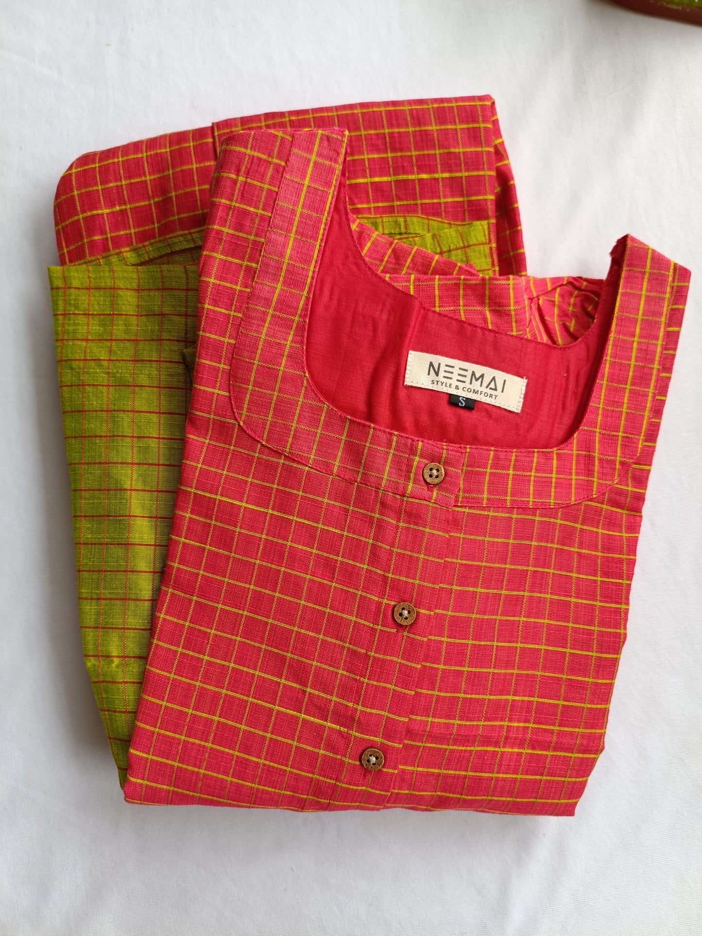 Neemai orange butter silk checkered maternity dress with green checks, front button design, lightweight breathable pregnancy wear, summer friendly festive ethnic collection