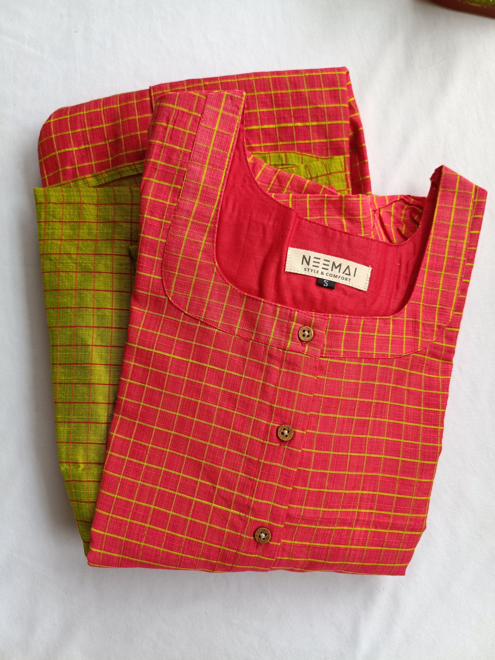 Neemai orange butter silk checkered maternity dress with green checks, front button design, lightweight breathable pregnancy wear, summer friendly festive ethnic collection