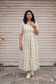 NEEMAI white printed muslin cotton feeding maxi gown with cute cloud and raindrop pattern, breathable lightweight fabric and comfortable maternity wear fit for everyday comfort.
